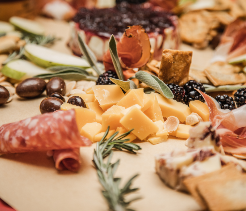 rtisan grazing table with cheese, meats, fruit and antipasti by Neighbourhood Catering Neighbourhood Catering | Wedding, Event & Corporate Catering in Darlington & Teesside