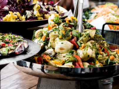 A vibrant mixed vegetable salad with a variety of fresh colours and textures.